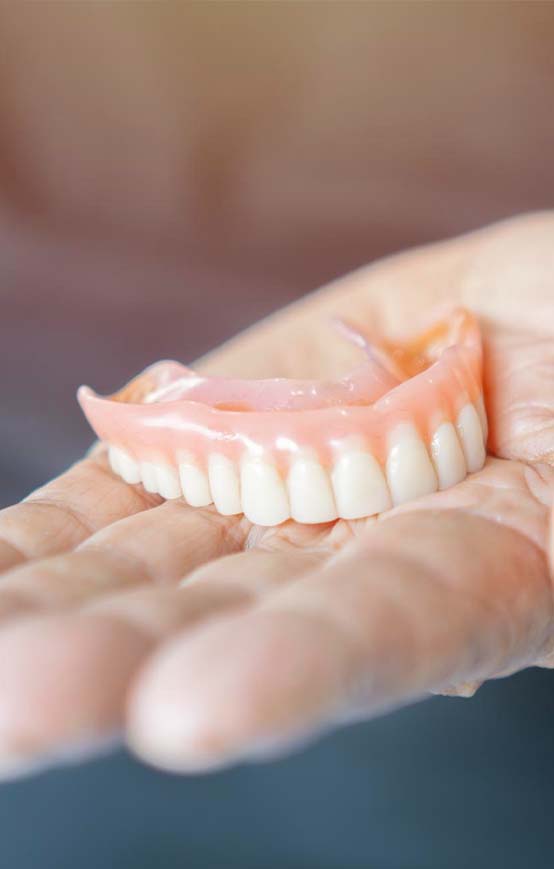 sostituzione dell'intera arcata con protesi in Albania