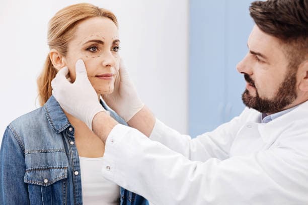Doctor consulting with patient for mini facelift