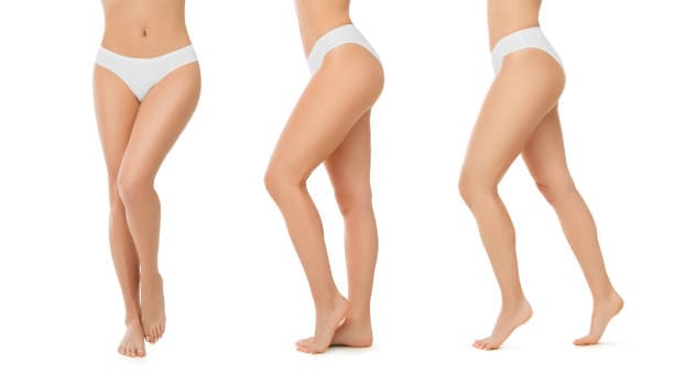 Set of long woman's legs with smooth beautiful skin isolated on white