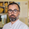 Dr. Elton N. Peçi